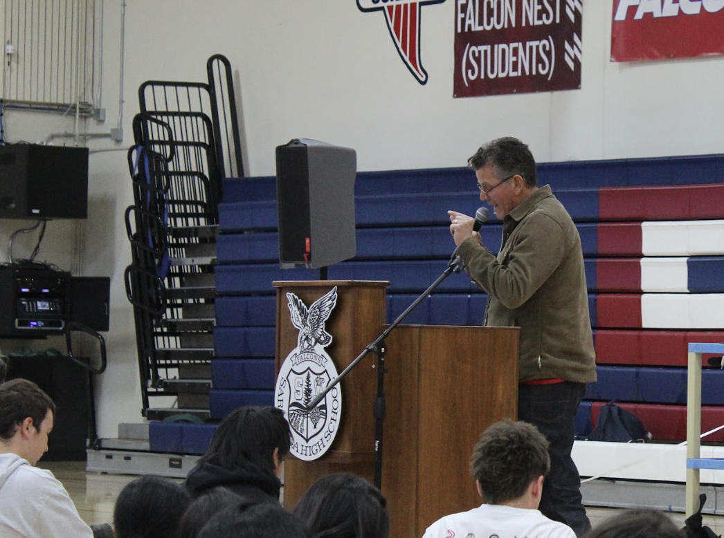 English teacher Marcos Cortez speaks to the whole school during the Speak Up For Change Rally on Jan. 24.